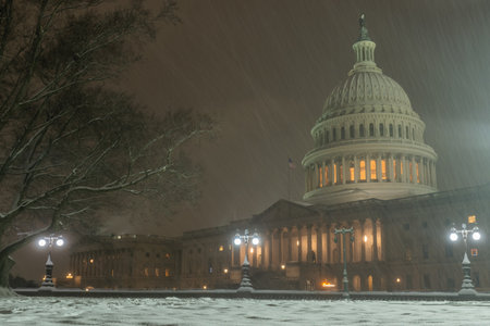 Capitol building in snow. Winter Capitol hill, Washington DC. Capitols dome in winter night snow....