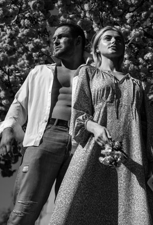 Spring fashion people. Romantic portrait of a sensual couple in love. Beautiful young couple in love...