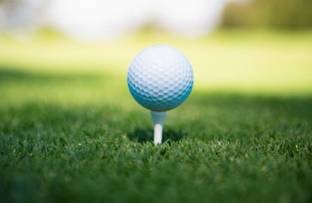 Golf ball on tee ready to be shot.の写真素材