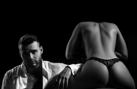 Intimacy couple, sensual concept. Loving sexy couple on balck.の写真素材