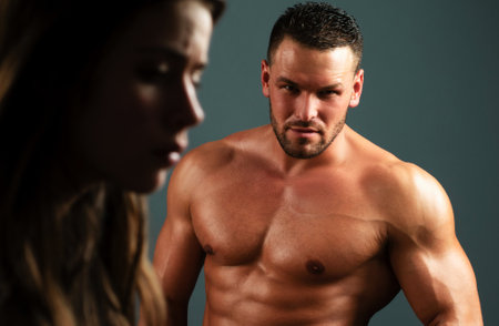 Treason concept. Brutal man with sad woman. Break up, divorce or treason in relations concept.の写真素材