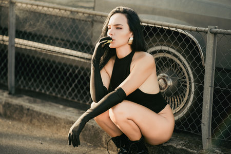 Vogue girl, street american fashion girl. Outdoors Fashion Portrait of fashionable Vogue woman in street style. Hipster Vogue girl. Urban culture. Fashion street serious look. Vogue style.の写真素材