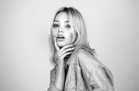 Fashion and beauty. Sensual blonde female model portrait. Young beauty woman face. Sexy look.の写真素材