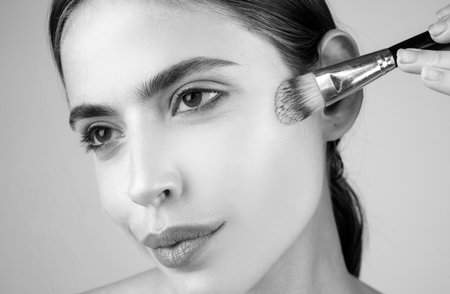 Beauty woman closeup face with natural make up, fresh beauty model young spa. Beauty treatment concept, portrait of young woman with cosmetic tonal foundation on face.の写真素材