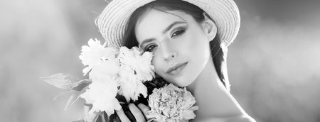 Beautiful young woman near blooming spring tree. Youth, love, fashion, romantic and lifestyle...