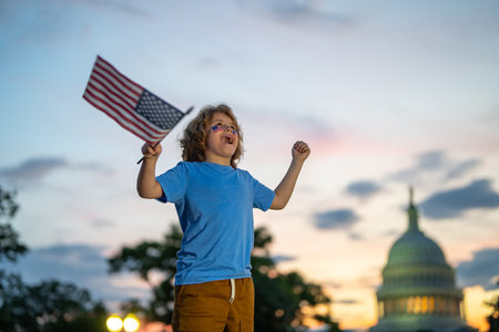 Vote for US Citizens. Kid with American flag near capitol in Washington DC. Voting concept. American Vote Day. Vote and elections in USA. American presidential elections, vote president in America.の写真素材