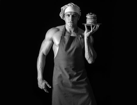 Pancakes sweet breakfast. Chef sexy baker serving dessert.の写真素材