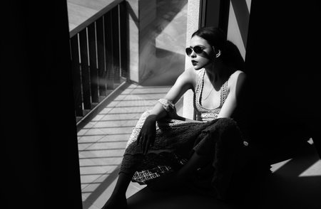 Fashion model in sunglasses, stylish woman in summer casual outfit.