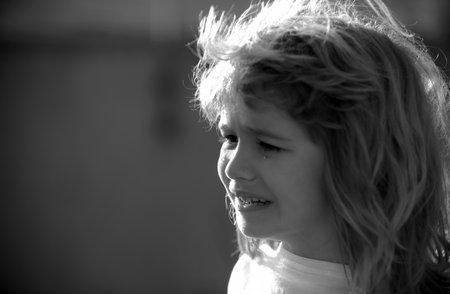 Sad child boy portrait. Children bad emotion and expression concept.