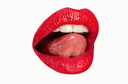 Sexy lips. Macro photo woman face detail. Lip make-up, red lipstick. Tender sensual lips. Beautiful girl mouth, close up. Isolated on white.の写真素材