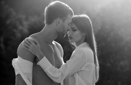 Young lovers hugging and embracing. Couple in love tenderness and affection.