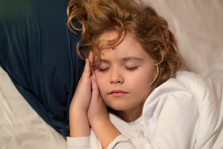 Healthy sleep. Cute kid sleeps in bed. Sleeping child.