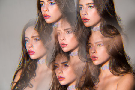 Art creative beauty woman face in kaleidoscope. A girl face in a kaleidoscope with reflections....