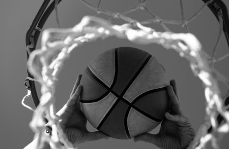 Basket ball, basketball championship. Basketball as a sports and fitness symbol of a team leisure activity playing. Hands and basketball.の写真素材