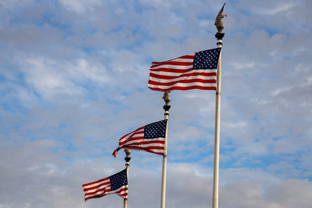 American flag on blue sky USA. Flag waving. Independence day. 4th of july. The American flag concept.の写真素材