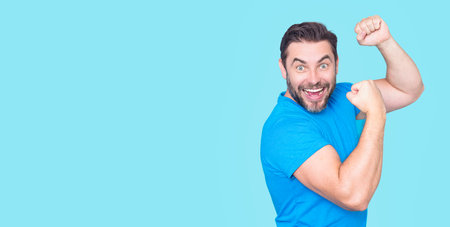 The success. Excited winner. Winner gesture with raised arms. man screaming for success. Amazed Happy winner. Ecstatic excited male winner celebrating win. Overjoyed business man enjoy victory.の写真素材