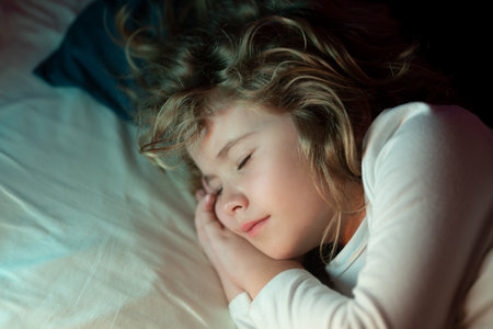 Sweet sleep. Kid sleeping on bed at home. Bedtime, kids sleeps. Child asleep on pillow, having healthy sleep.の写真素材