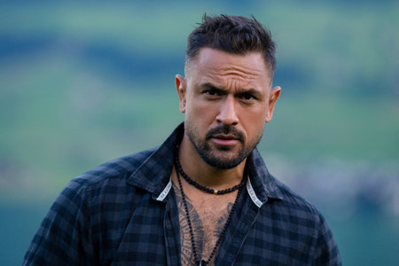 Portrait of the serious handsome man. A Hipster guy model headshot. Male serious face. Handsome...