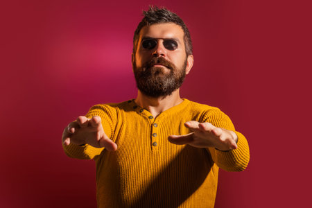 Blind man. Visually impaired. Despite disability. Bearded blind man wearing glasses, studio...