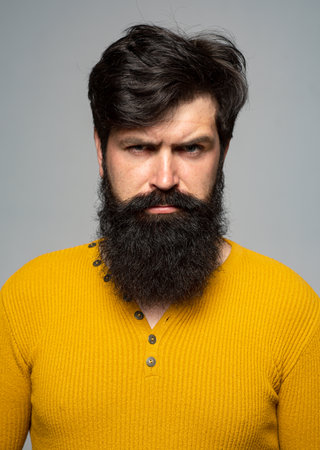 Portrait of the handsome man. A Hipster guy model headshot. Male face. Bearded handsome man....