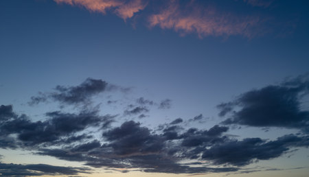 Sunset or sunrise. Dramatic majestic scenery sunset. Sky with clouds in sunset sky light background....