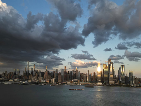 New York City. NYC aerial view, New York City Skyline with dramatic sky. Panoramic drone view on Manhattan in NY. Sunset in NYC. New York City Midtown skyline view at dusk with dark clouds.の写真素材