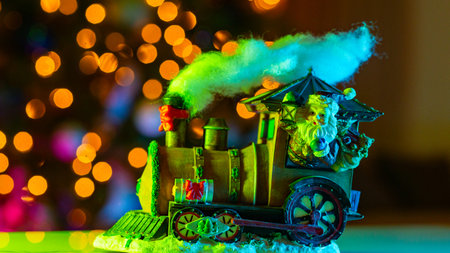 Santa Claus in Christmas Train. Shipping the New year gift. Christmas Polar Train with Christmas...