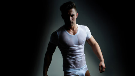 Sexy male model with perfect muscular naked body. Shirtless sexy muscled male model. Muscular...