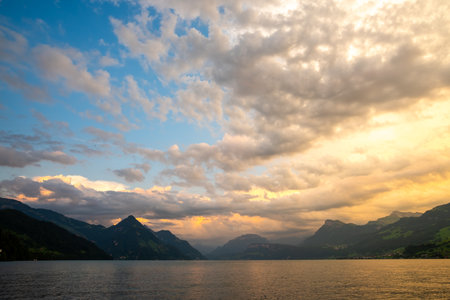 Mountain in the Switzerland in summer, panoramic view with mountain. Switzerland Alps mountains. Alpine mountain scenery. Mountain with lake in Alps. Mountains over the lake and the alps in Switzerland.の写真素材