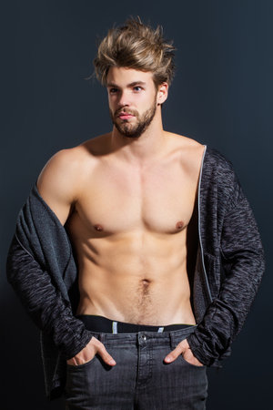 Handsome man with muscular topless body. Muscular torso. Strong brutal guy. Portrait of handsome athletic man. Muscular model. Handsome young man with naked body, bare torso, undressed. Sexy man.の写真素材