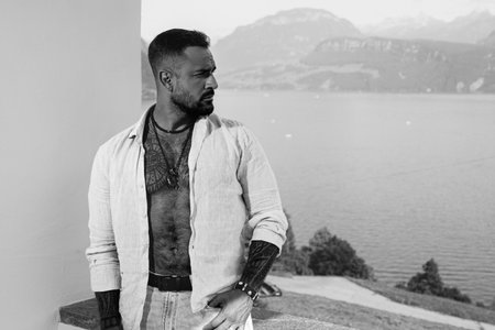 Portrait of the handsome man outside. A Hipster guy model headshot. Male face. Hispanic handsome man. Confident male model. Man looking proud. Closeup face of attractive man. Elegant guy.の写真素材