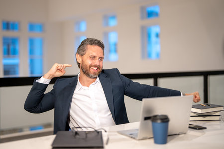 Business man entrepreneur startup owner in modern office. Occupation person in work space. Business portrait. Excited business worker. Business, finance and employment. Successful office worker.の写真素材