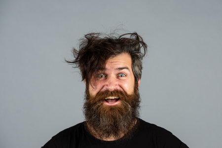 Good morning. Funny crazy Man awake in morning. Portrait of man with messy hair. Morning wellness. Morning routine for guy.の写真素材