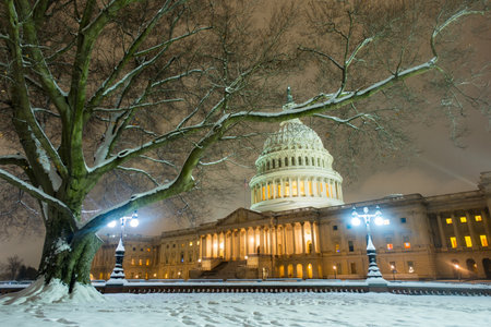 USA Capitol in winter. Congress. American Capitol Building in snow. Washington city Capitol. United States Capital. Washington, USA landmark. Supreme Court. Washington D.C. monument. Washington city.の写真素材