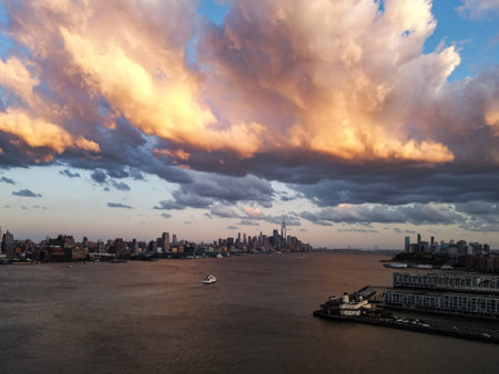 Cloud in NYC, New York City Skyline with dramatic sky. American Urban Skyscrapers USA near dramatic clouds. New York City skyline, cityscape of Manhattan in New York. Panoramic view on Manhattan. USA.の写真素材
