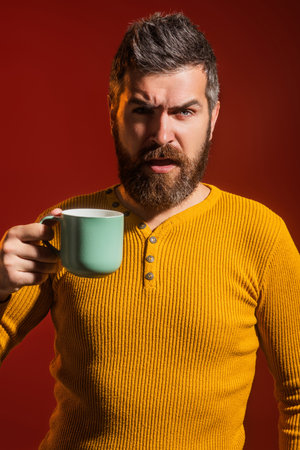 Good morning. Man awake in morning drink coffe. Portrait of man with cup or mug. Morning hygiene. Morning routine for guy. Happy wake up.の写真素材