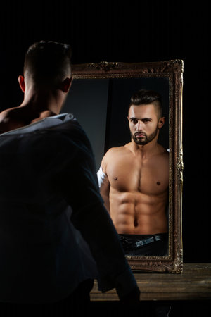 Sexy man with perfect muscular naked body. Shirtless sexy muscled male model. Muscular handsome guy...