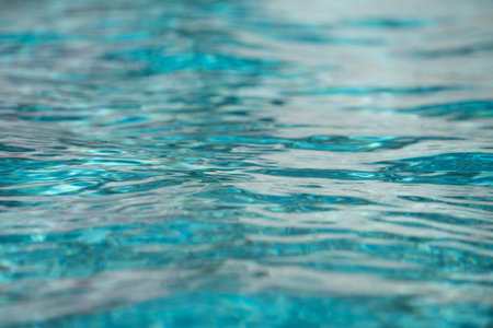 Tansparent clear calm water surface texture. Abstract nature background. Sea water pattern.の写真素材