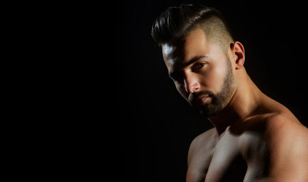 Sexy male model with muscular nude body. Shirtless sexy male model. Muscular handsome model with strong body. Sexy muscle model. Sexy man with naked torso, fit naked man.の写真素材