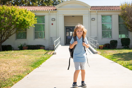 Kid school boy enjoy school vacation. Day out or weekend. Knowledge day. Vacation or school break.の写真素材