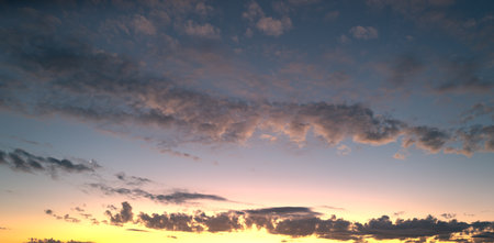 Sunrise background. Dramatic majestic scenery sunset. Sky with clouds in Sunrise sky light...