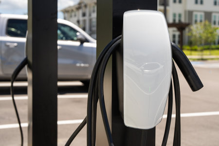 Power supply for electric car charging. Electric car charging station. Socket for electrical car battery charger. Electronic vehicle power dock. EV Plugin station. Fuel recharge cells. Electric car charging.の写真素材