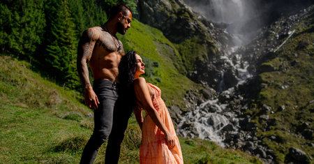 Sexy couple on nature. Couple in passionate pose. Beautiful passionate couple outdoor. Young...