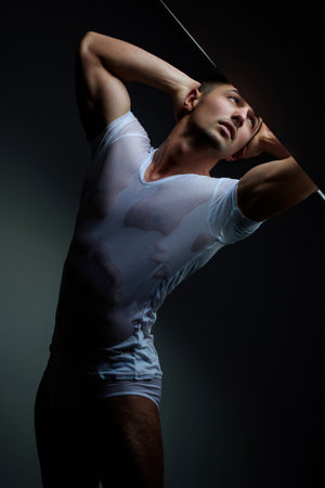 Man in classic shorts boxers underwear. Sexy man in muscular naked body in underwear. Male model with muscles in underwear. Young guy with perfect muscular body, torso posing in boxers underwear.の写真素材