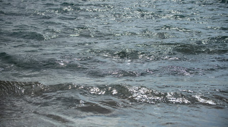 Tropical blue ocean. Summer sea in clean and clear water from surface for background. Waves concept...