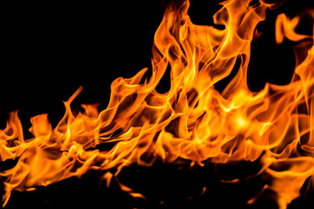 Blaze burning fire flame on art texture background.