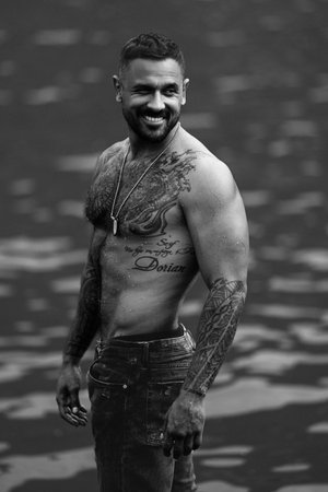 Man in nature. Man with bare torso outdoor. Muscular male model on rural farm. Rural man. Strong shirtless muscular man on nature. Mature muscular hispanic guy on nature.の写真素材