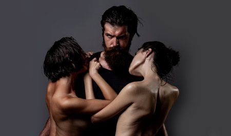Threesome concept. Three models together. One man and two women. Romantic of Threesome.の写真素材