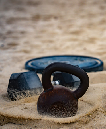 Sports equipment. Kettlebell background. Kettlebell barbell and dumbbells for summer sport....