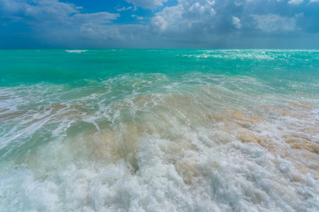 Sea waves background. Summer holiday. Ocean water motion. Ocean splash wave background. Deep blue sea beach. Turquoise wave. Dreamy exotic sea beach. Beautiful sea beach waves.の写真素材